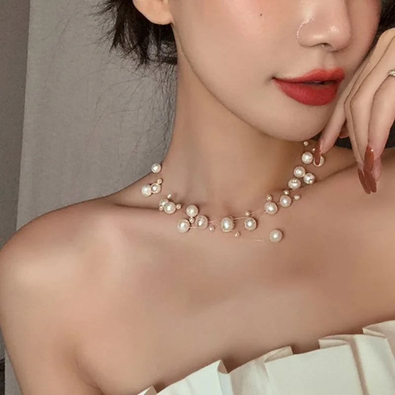 Glory Pearl Choker (Handcrafted with unique pearls, this luxurious piece exudes sophistication and elegance)