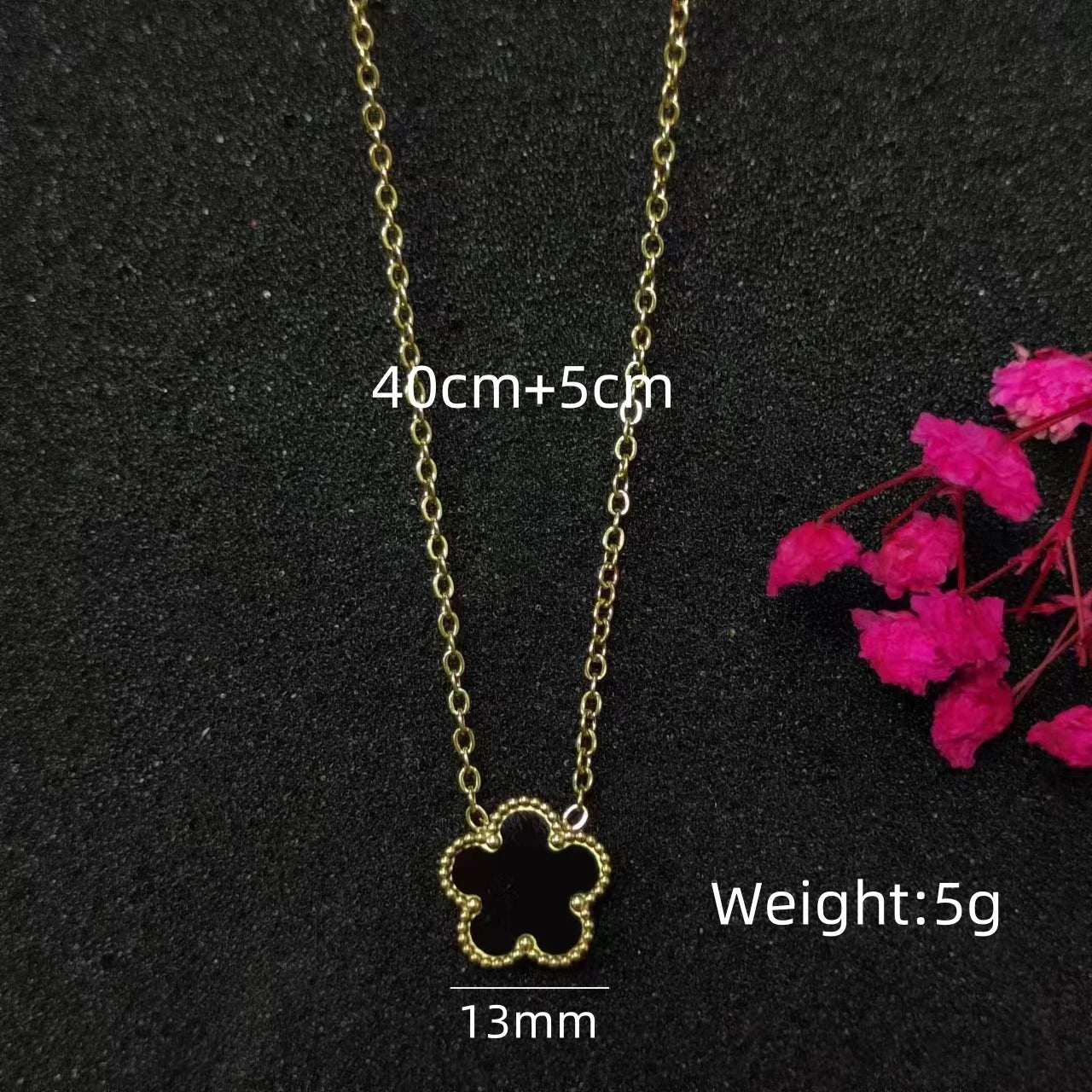 Delicate Clover Pendant (Crafted with intricate details, it adds a touch of sophistication to any outfit
