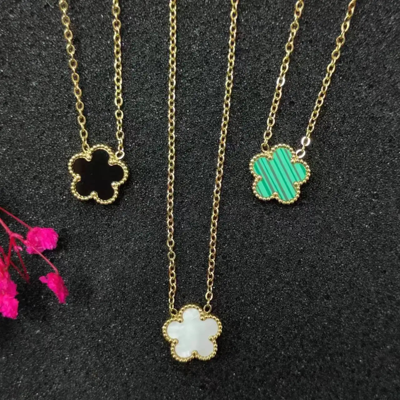Delicate Clover Pendant (Crafted with intricate details, it adds a touch of sophistication to any outfit