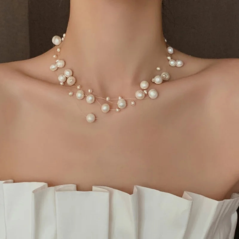 Glory Pearl Choker (Handcrafted with unique pearls, this luxurious piece exudes sophistication and elegance)